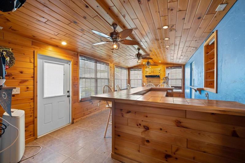 Bar room with wet bar & Jenn Air grill