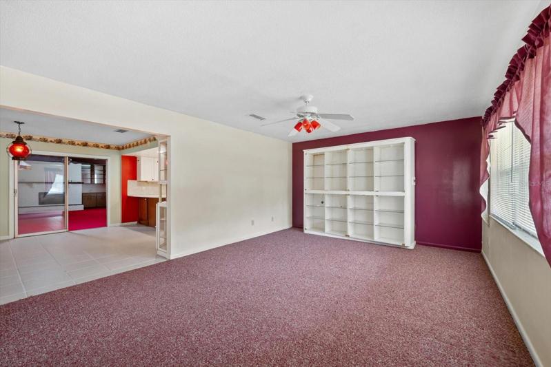 Living room w/entrance into kitchen
