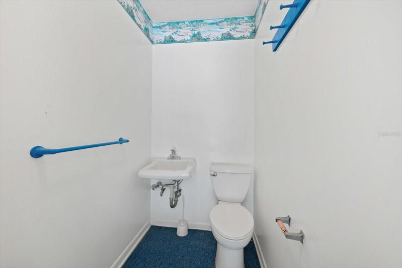Half bath located in garage