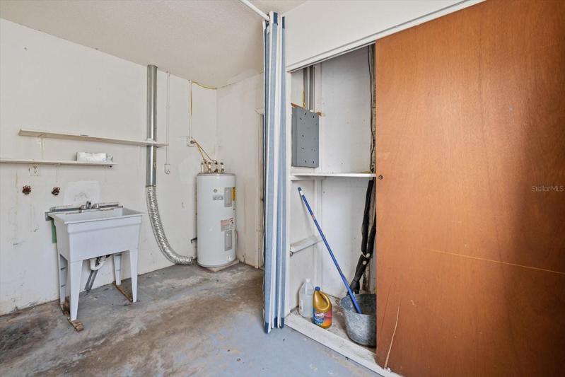 Laundry & storage in back of garage