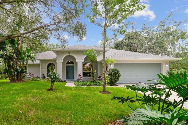 Perfectly situated on the shores of Lake Minnehaha this beautifully maintained 4-bedroom, 3-full bath home has DEEDED LAKE ACCESS, an UPDATED ROOF (2017), A/C (2021), FRESH INTERIOR & EXTERIOR PAINT (2023) and a partial LAKE VIEW!
