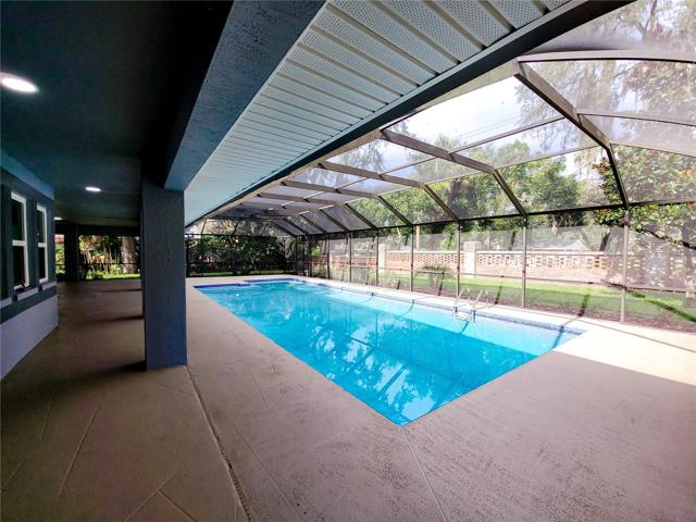 Beautiful Pool that is oversized with a sitting area to the South End of the pool