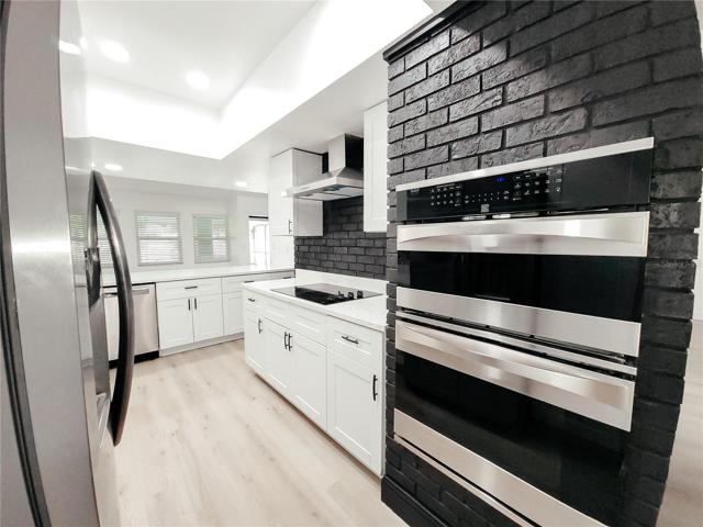Stainless Steel Kenmore Elite Wall Oven Combo, Side by Side Refrigerator