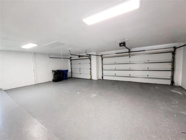 Epoxy finish in the 3 car garage that boasts about 800 sf of space
