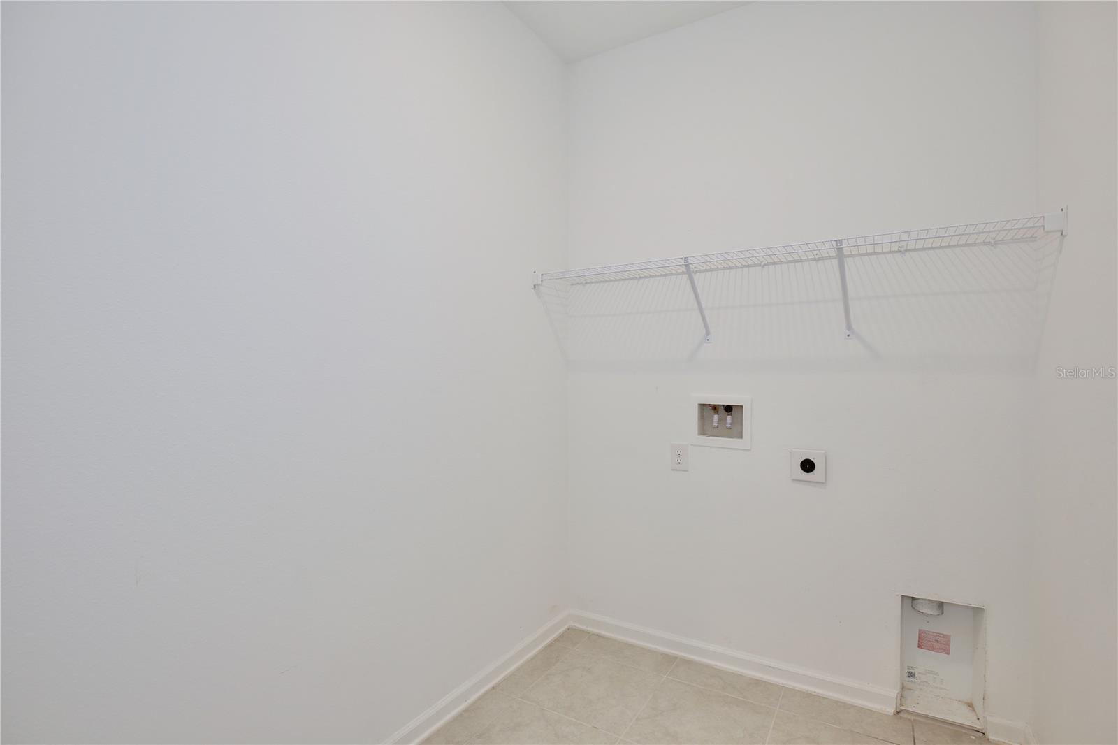 Roomy laundry room.