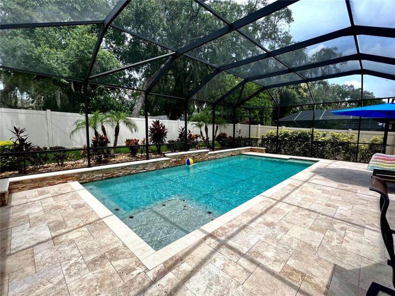 Screened saltwater pool.