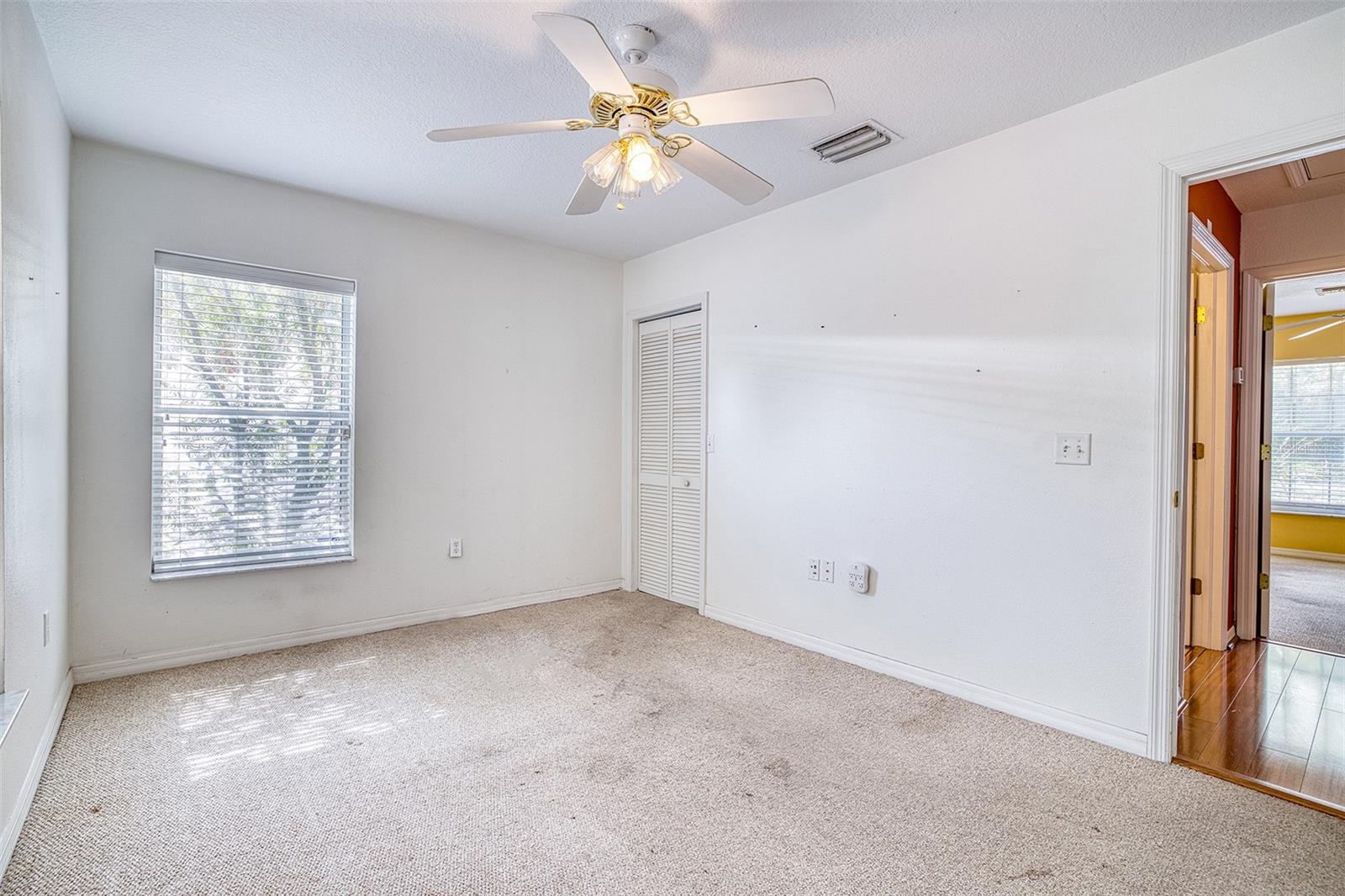 Secondary bedroom with walk-in closet.