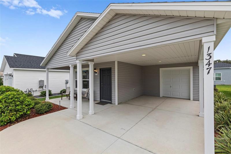 Carport with Golf Cart Garage behind
