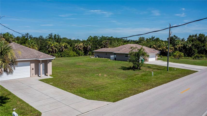 2.5 garage, lot, home with 4 car garage