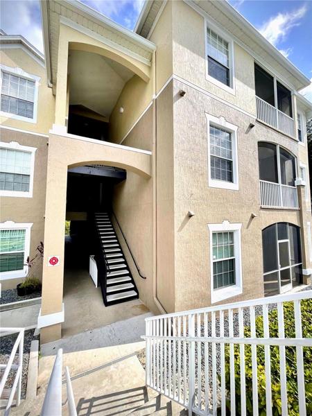 Front view of building First floor end unit