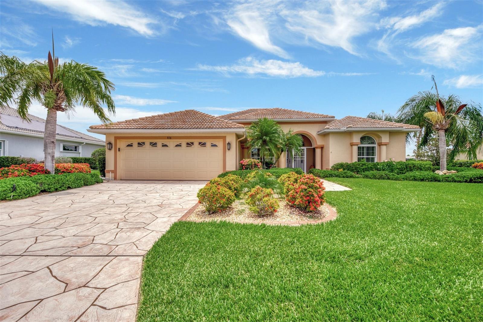 Stamped Driveway and Lush Landscapping
