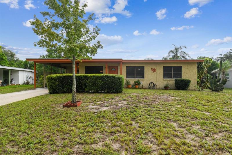 Large Front Yard with Privacy Shrubs and Beautiful Cactus!