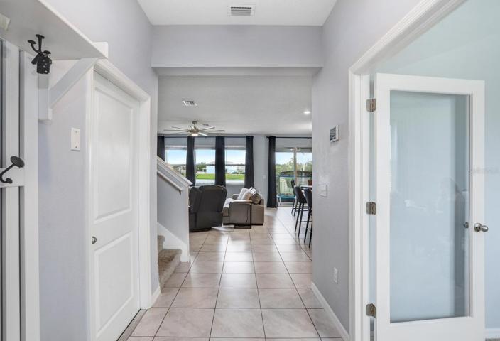 Upon entering - door on the left is to the garage and the glass door on the right is to the office