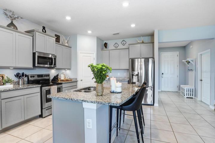 Open kitchen with island and pantry