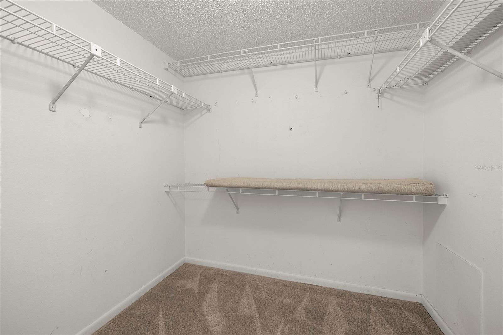 The spacious walk-in closet