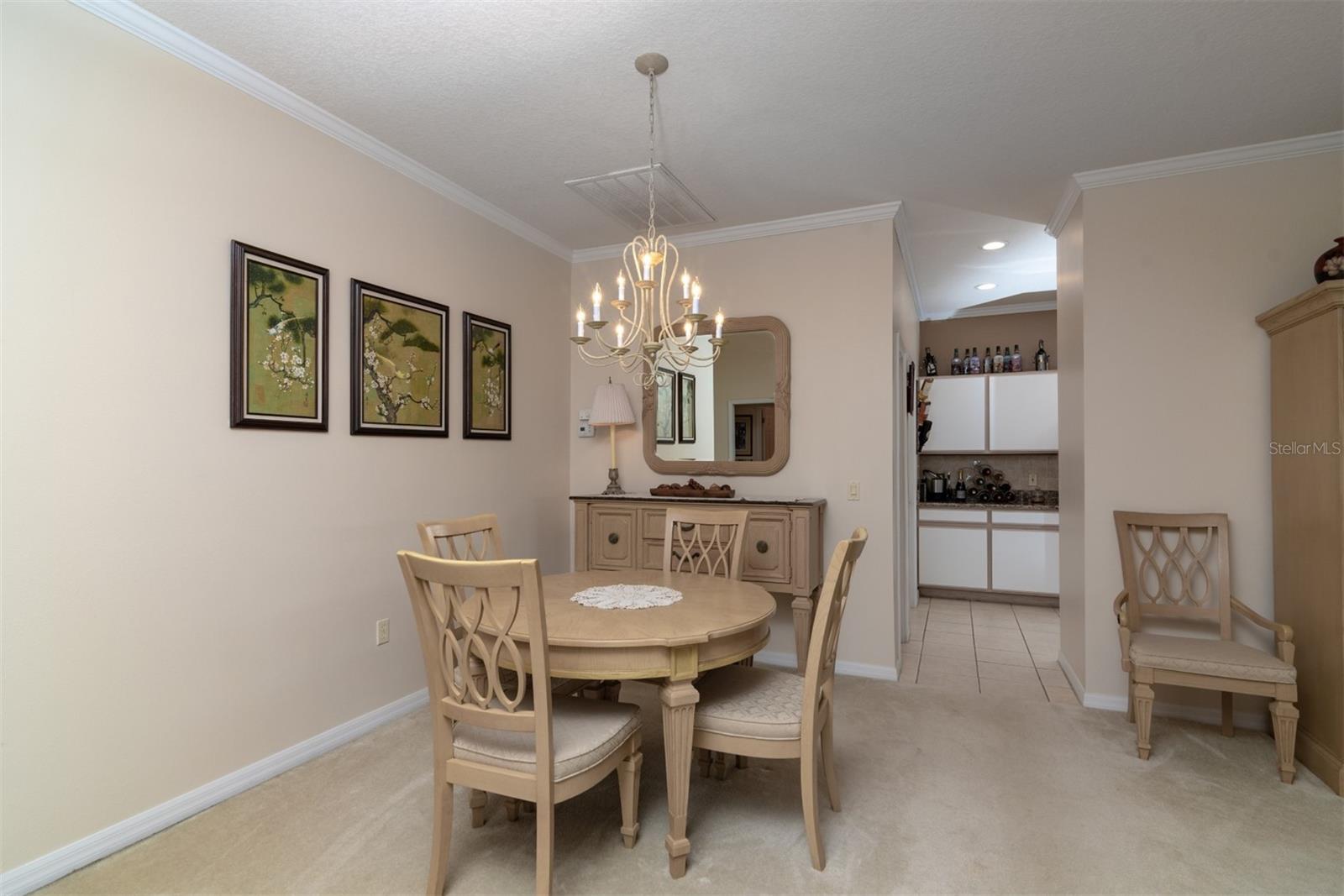 The dining area space is flexible when entertaining needs vary.
