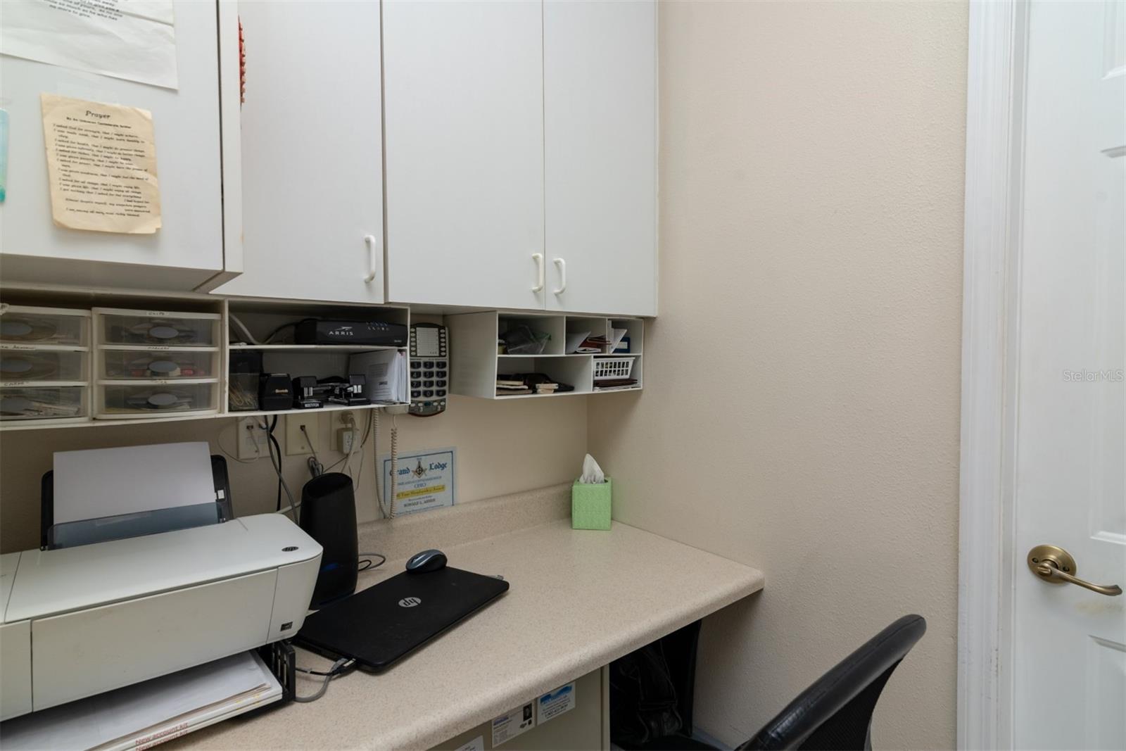 A mini-office area has been installed in the utility room.
