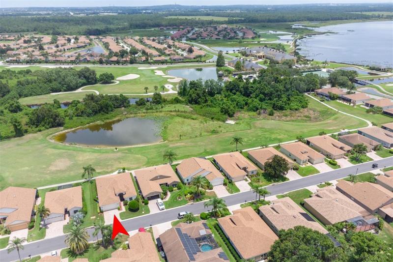 This home is located on the 14th fairway and is close to the main clubhouse that is seen in the background.
