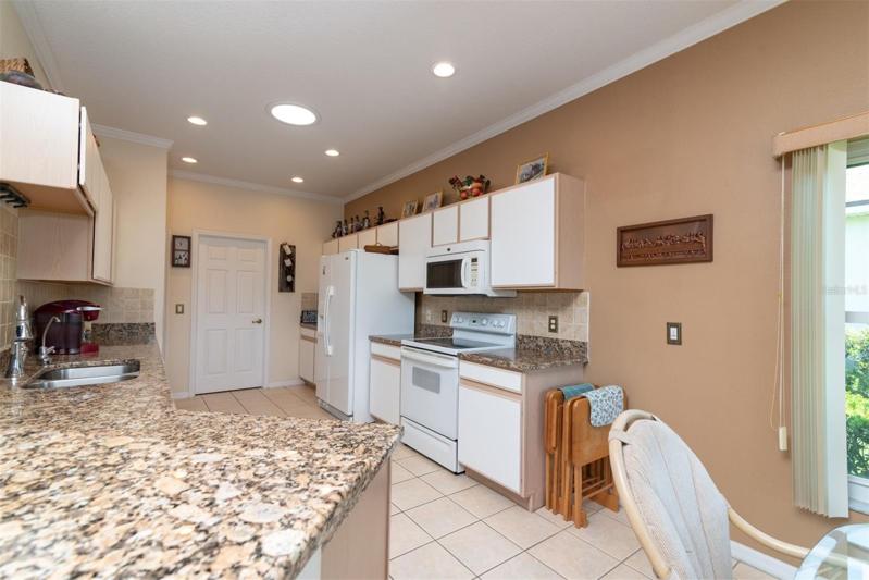 The kitchen has a solar tube that provides natural light.