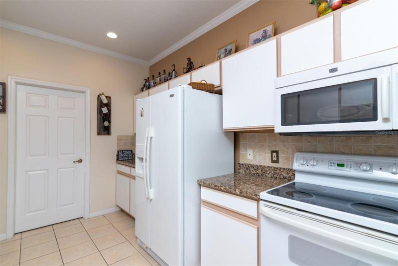 The doorway in the background opens to the interior laundry room and the attached 2 car garage.