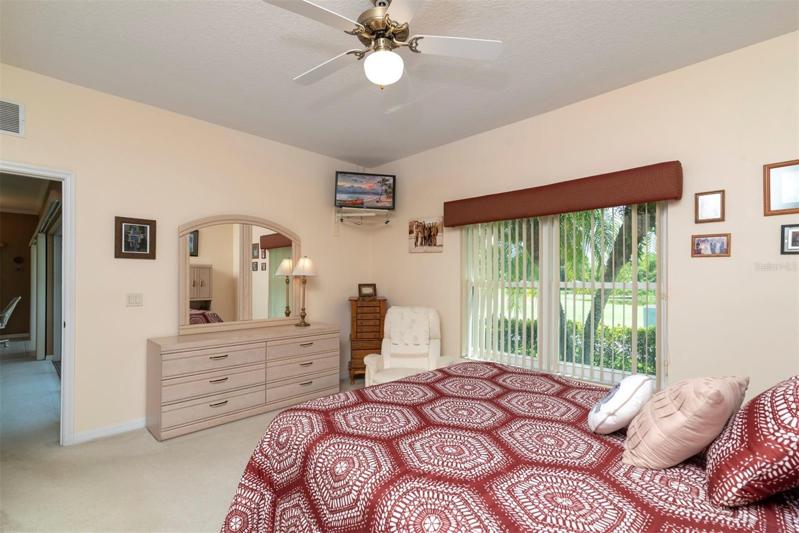 The master bedroom has a double window with a great view.