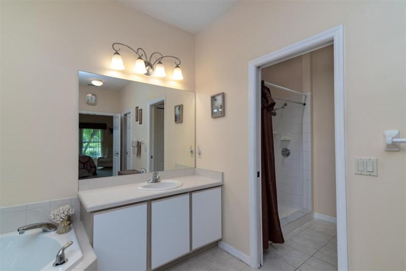 The master bath has upgraded lighting fixtures.