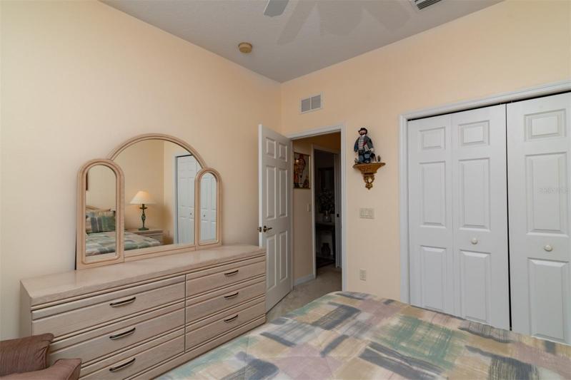 The guest bedroom is adjacent to the guest bathroom and has a large reach in closet.