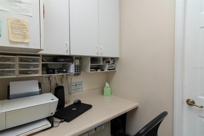 A mini-office area has been installed in the utility room.