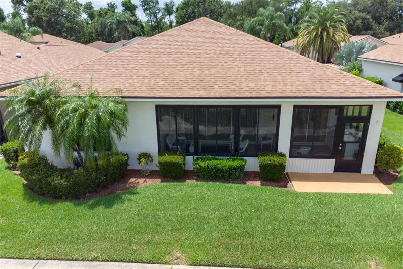 The enclosed and covered lanai dominates the rear of this fantastic home.