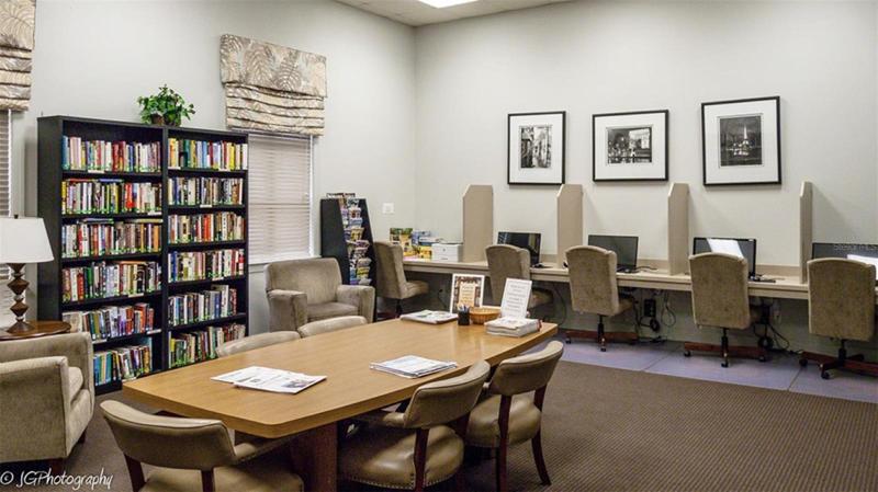The main clubhouse media room has computers for resident use and a large honor system lending library.