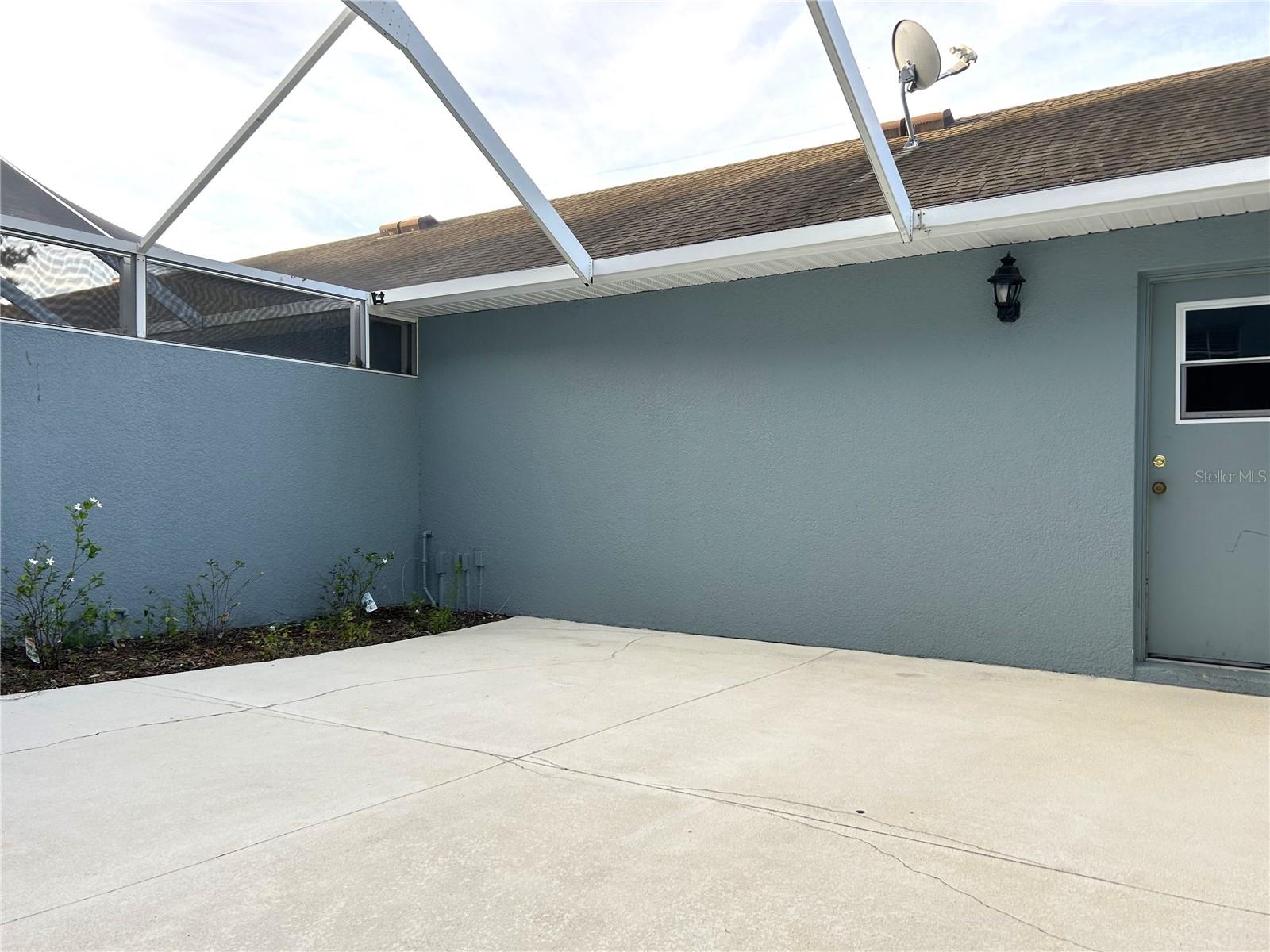 Lanai leads to Detached 2 car garage