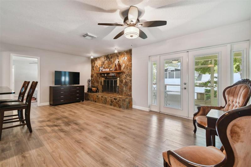Fire up the fireplace on cooler nights or throw open the French doors when the weather’s right