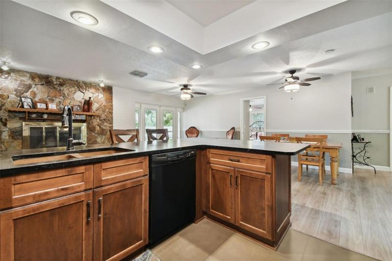 Keep the popcorn in the kitchen. No popcorn ceilings in this home, they have all been updated with a knockout smooth finish.