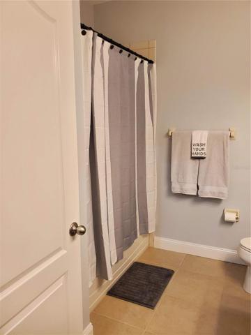 guest bathroom with tub
