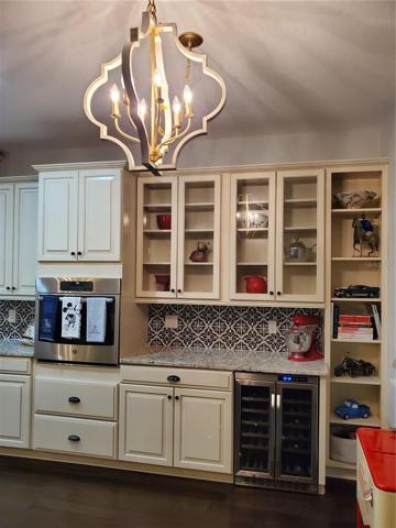 upgraded beverage nook complete with built-in wine fridge