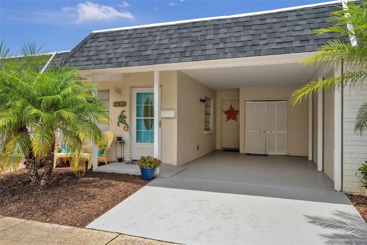 Carport with W/D hook up and storage room
