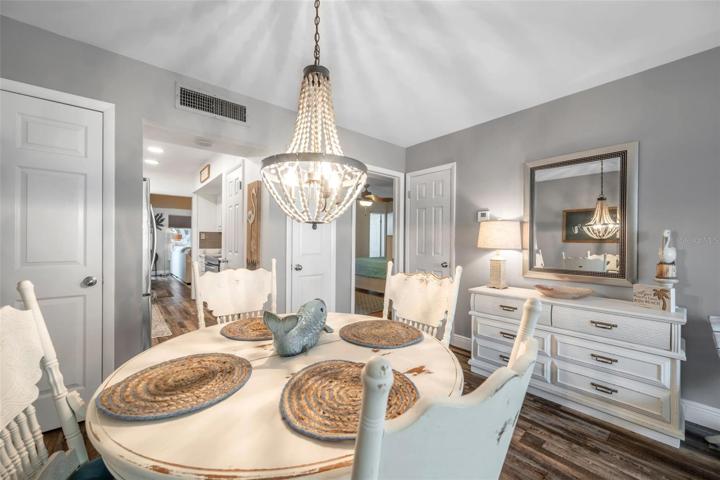 Love the Coastal feel and Chandeller !