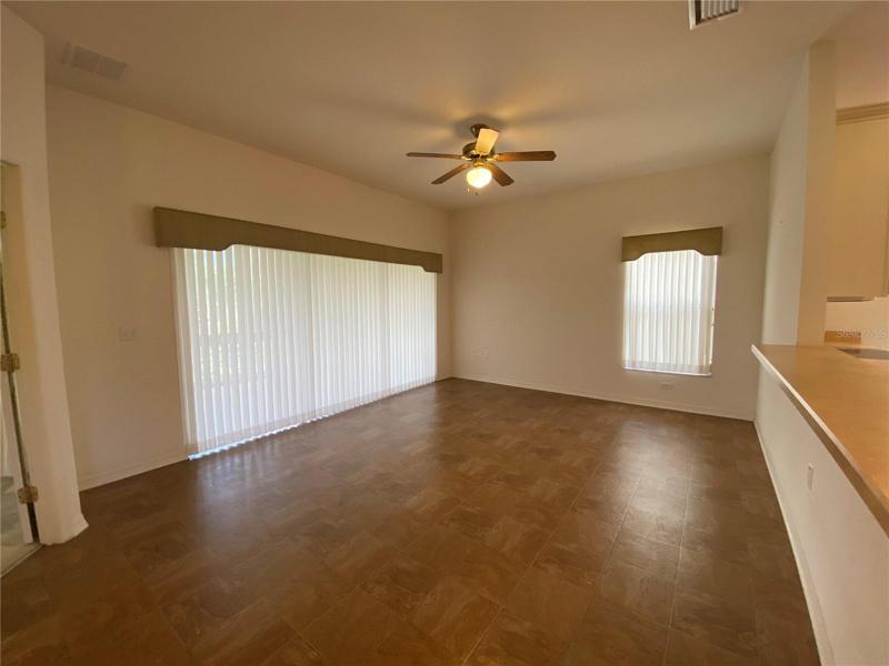 Living Room Area. Triple Slider Doors to Lanai
