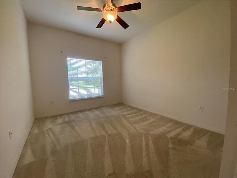 Guest bedroom with Ceiling Fan