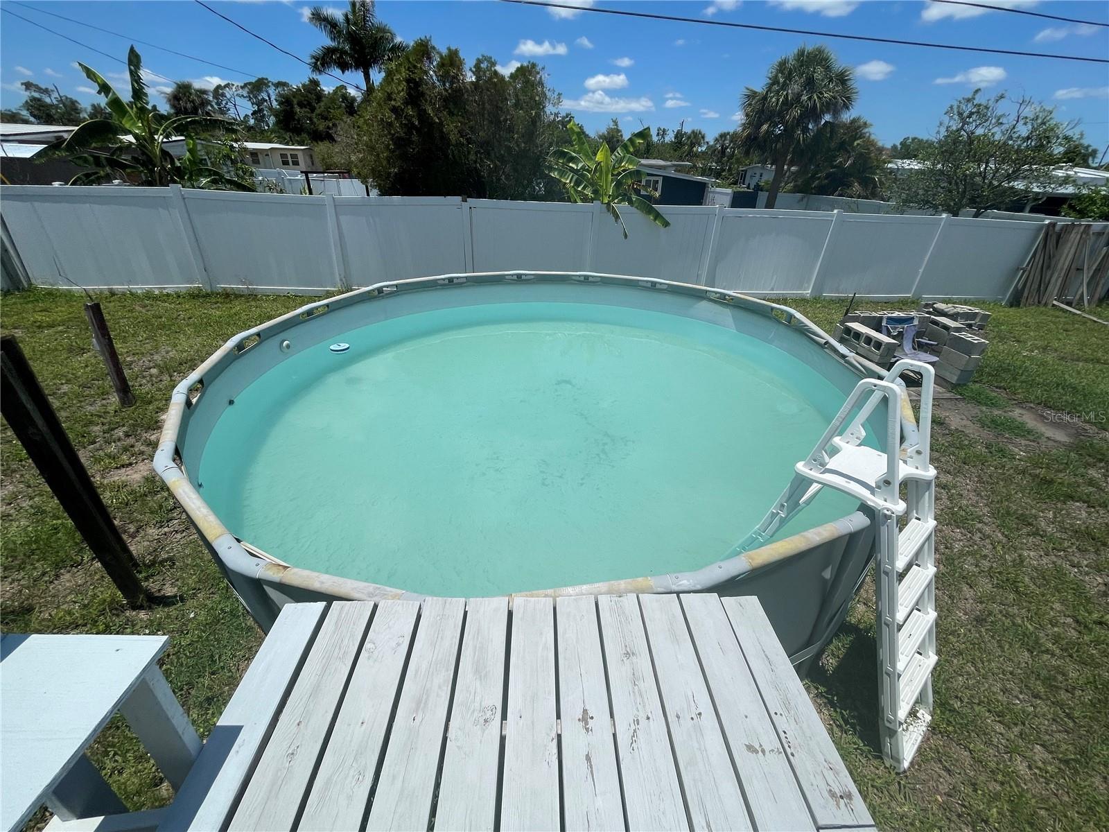 Above ground pool and deck
