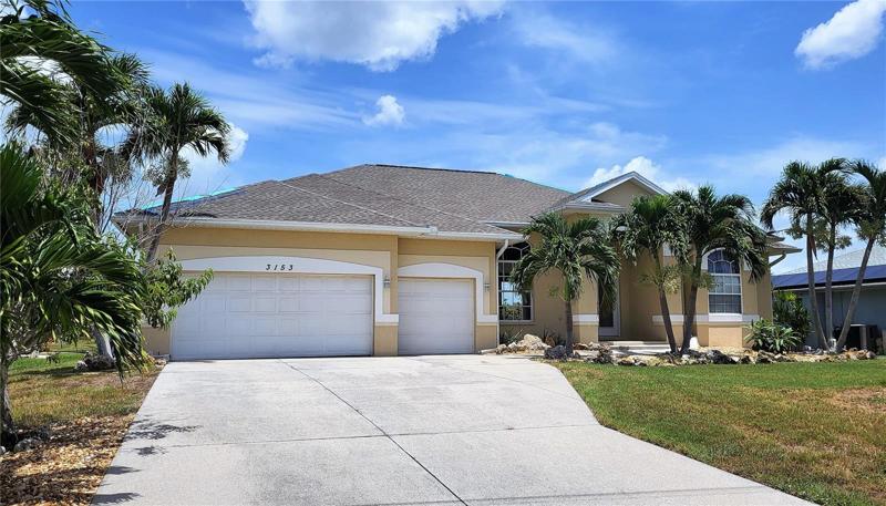 3 bedrooms, 2.5 baths, 3 car garage, pool, and dock!