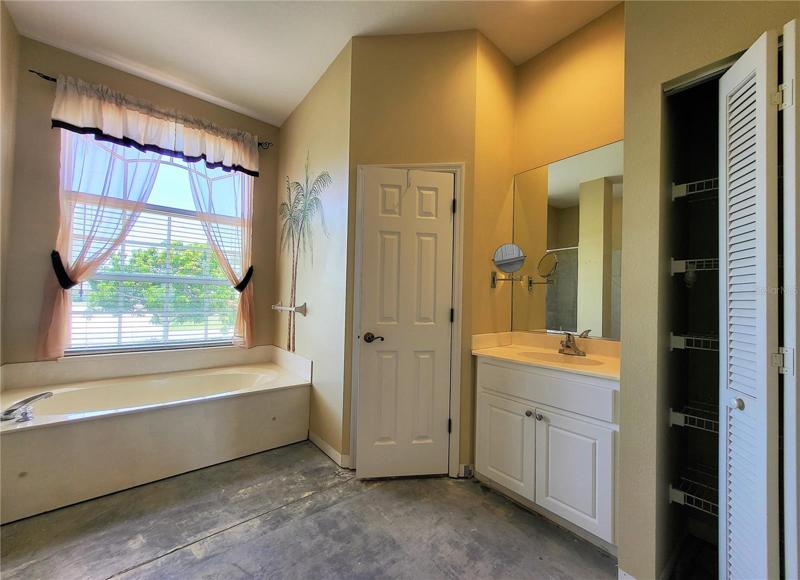 Linen closet on the right. Door in center is for the toilet