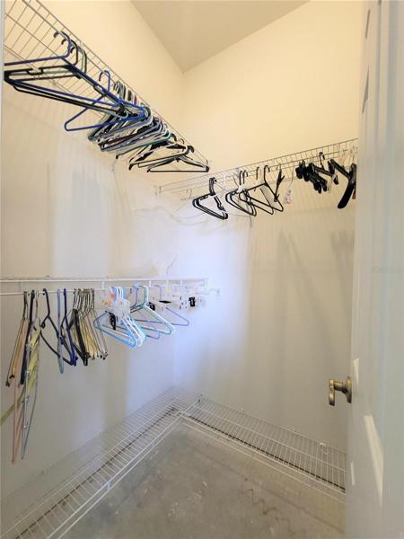 Closet 2 has shelving and shoe rack