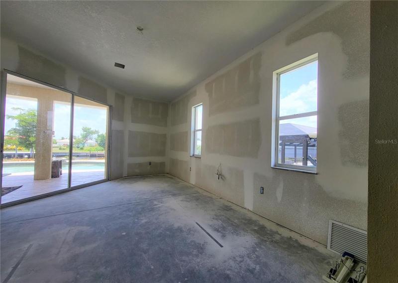 Two windows and glass sliders provide lots of light