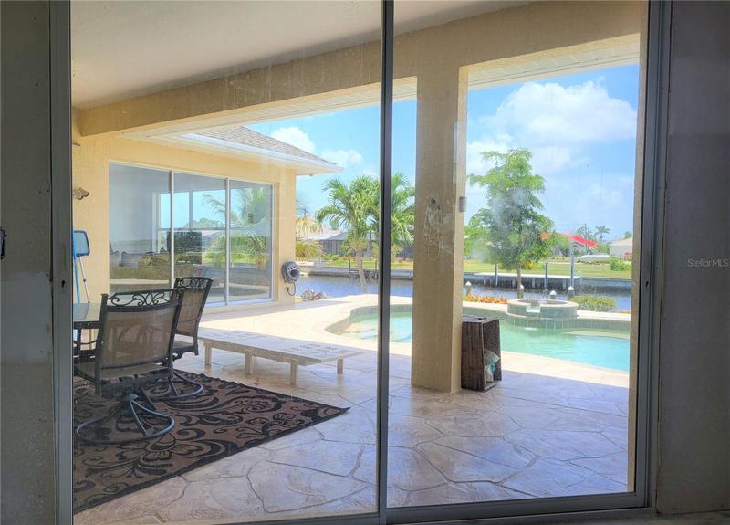 Large sliders lead out to the lanai and pool area, Get out of bed, and step outside for a dip before breakfast