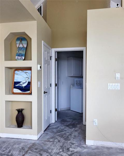 Hall to Laundry room & Garage. Pantry door on the left
