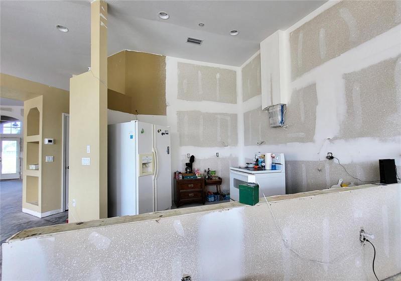 Ceilings have been painted. Walls are ready to finish and add cabinets in your own configuration