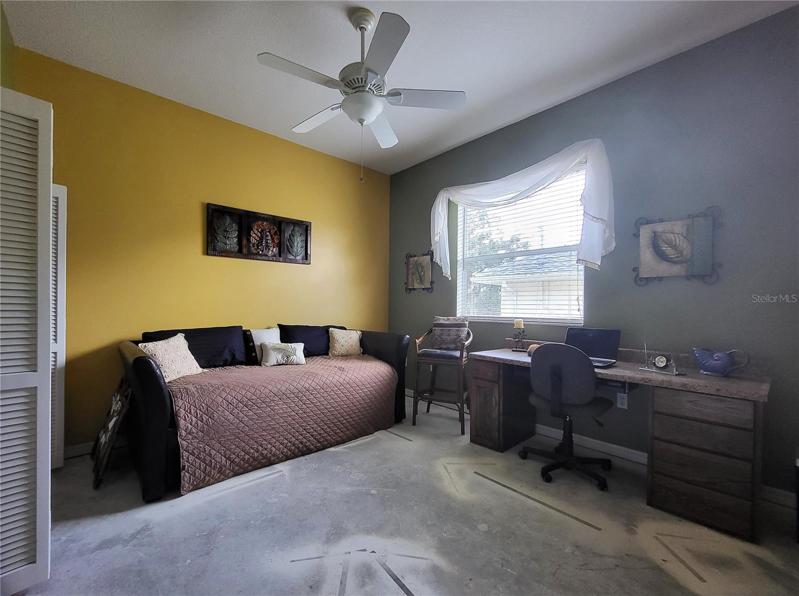 This second bedroom had no damage, but flooring was removed