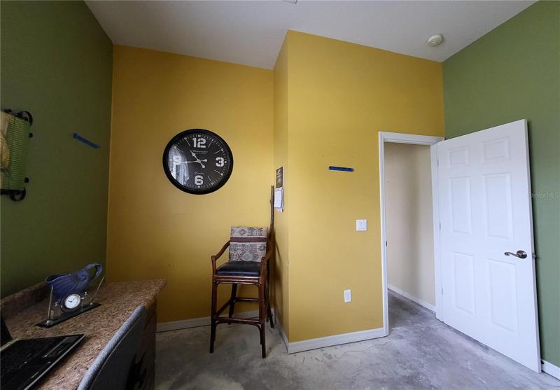 Recessed area could house a built-in desk or storage