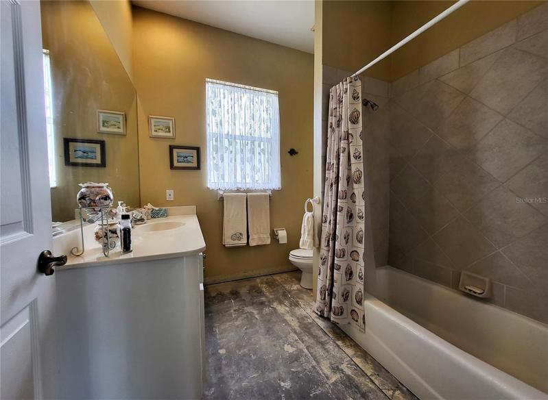 The guest bathroom also just needs flooring